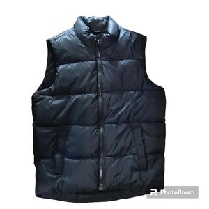 Blue puffer vest. Front zipper closure, fleece lined warm. Winter vest.